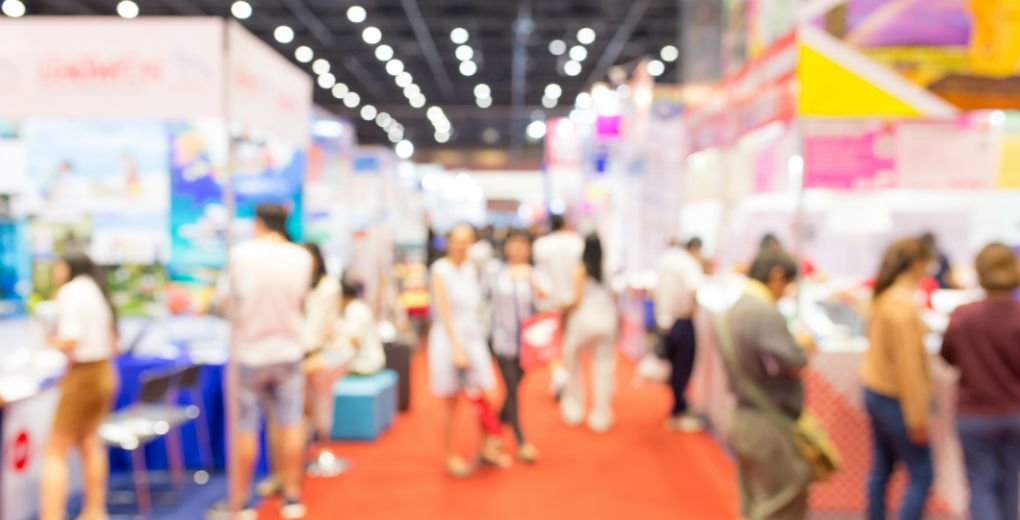 Blurred convention reflect trade show insurance in Northumberland and Newcastle